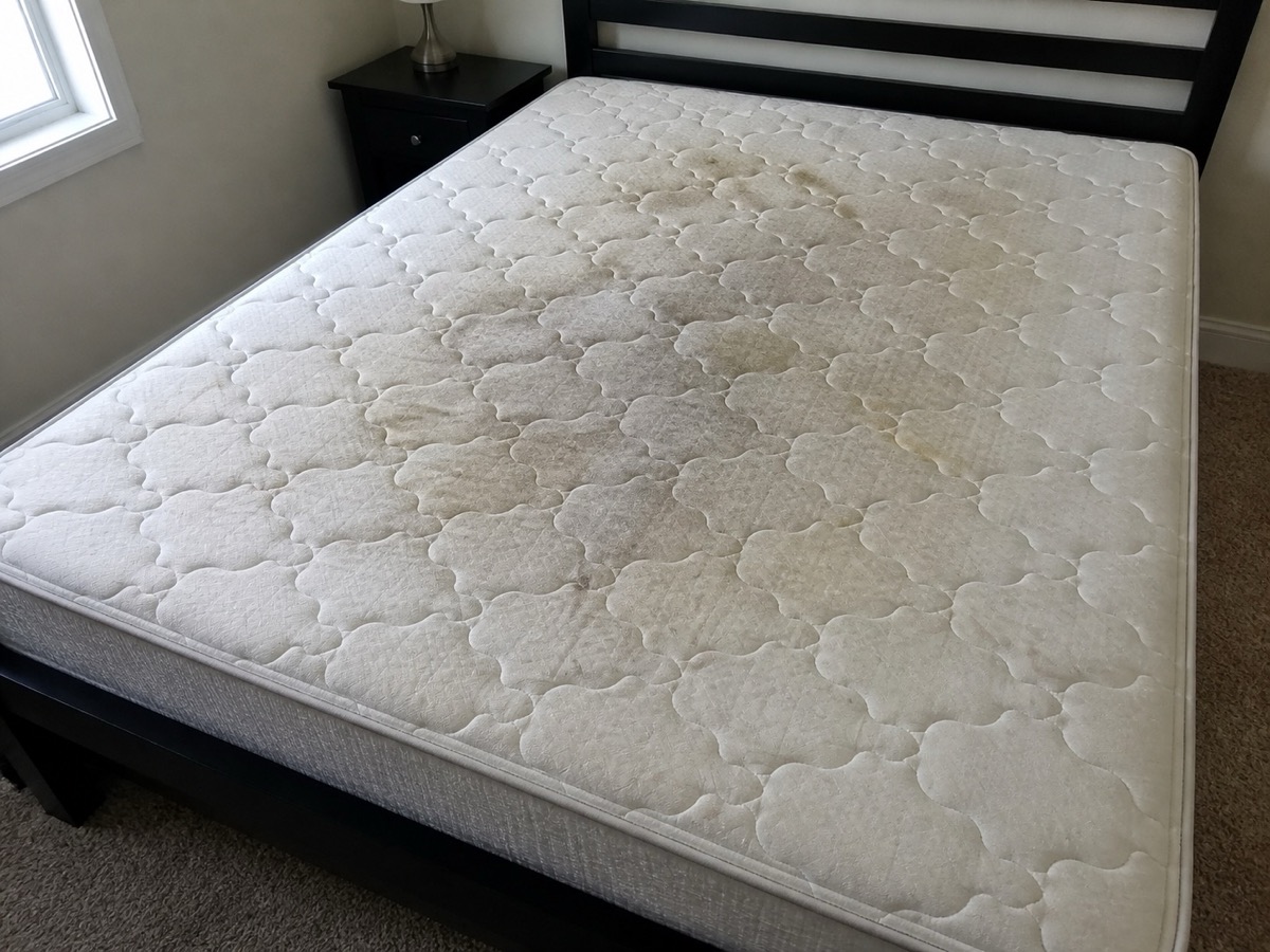 Before: A stained mattress top, then the same mattress after cleaning