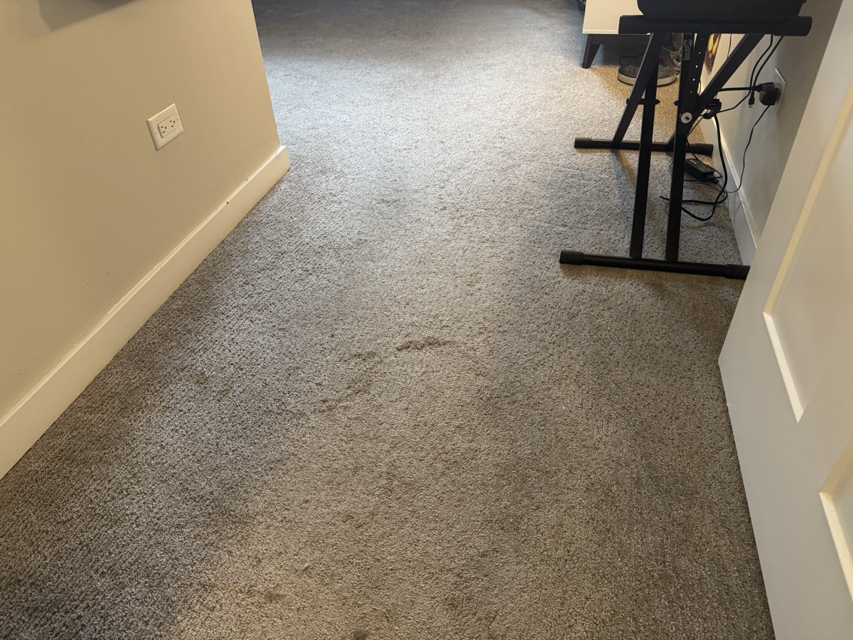 Before: Children's room entrance with visible traffic spots