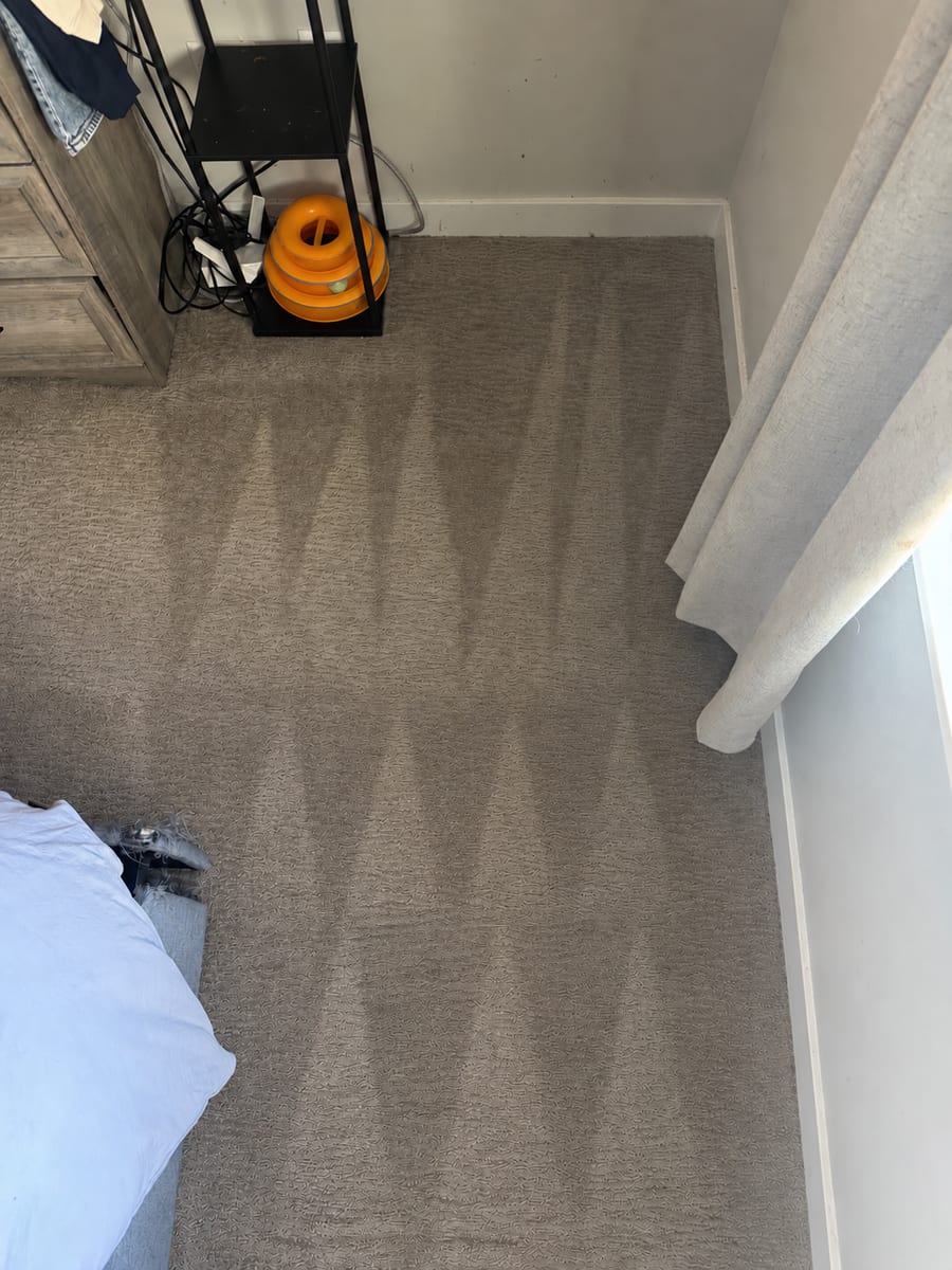 After: The same bedroom corner after VLM cleaning